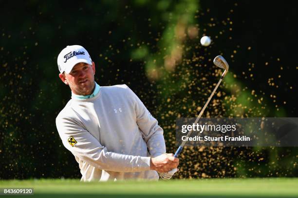 Bernd Wiesberger of Austria plays out of the bunker on the 15th during day one of the 2017 Omega European Masters at Crans-sur-Sierre Golf Club on...