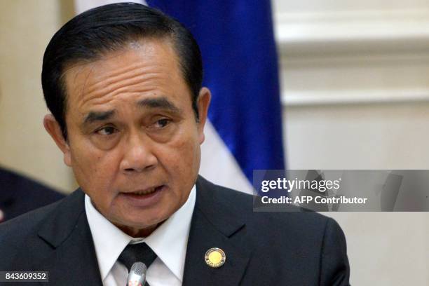 Thailand's Prime Minister Prayut Chan-O-Cha speaks during a press conference at the Peace Palace in Phnom Penh on September 7, 2017. The Thai leader...