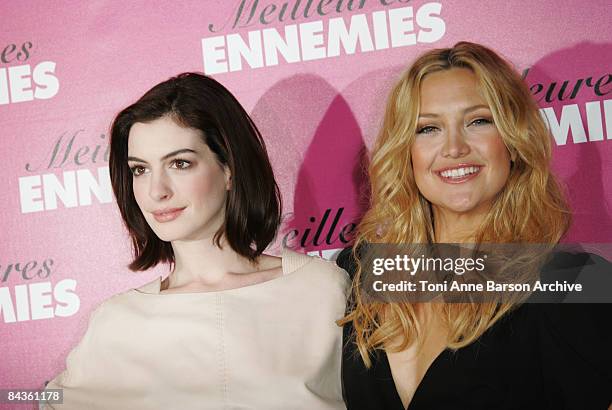 Anne Hathaway and Kate Hudson attend the "Bride Wars" photocall at the George V Hotel on January 19, 2009 in Paris, France.