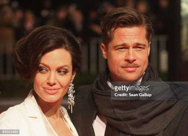 Actor Brad Pitt and actress Angelina Jolie arrive for the German premiere of "The Curious Case of Benjamin Button" at the Sony Center CineStar on...