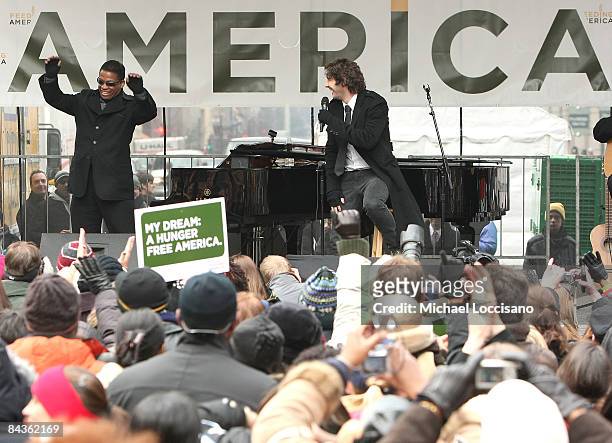 Musicians Herbie Hancock and Josh Groban perform together at the National Hunger Rally hosted by Feeding America at Martin Luther King Library on...