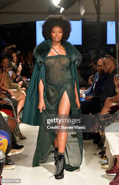 Model walks the runway for Fe Noel fashion show, a part of Harlem's Fashion Row during New York Fashion Week at La Marina Restaurant Bar Beach Lounge...