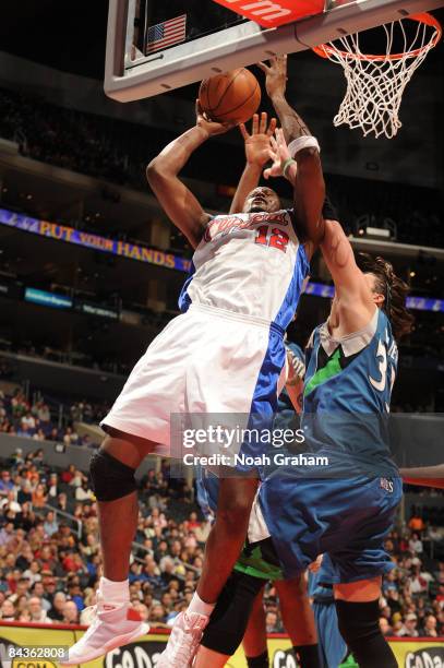 Al Thornton of the Los Angeles Clippers goes up for a shot against Mike Miller of the Minnesota Timberwolves at Staples Center on January 19, 2009 in...