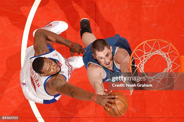 DeAndre Jordan of the Los Angeles Clippers blocks the shot of Kevin Love of the Minnesota Timberwolves at Staples Center on January 19, 2009 in Los...