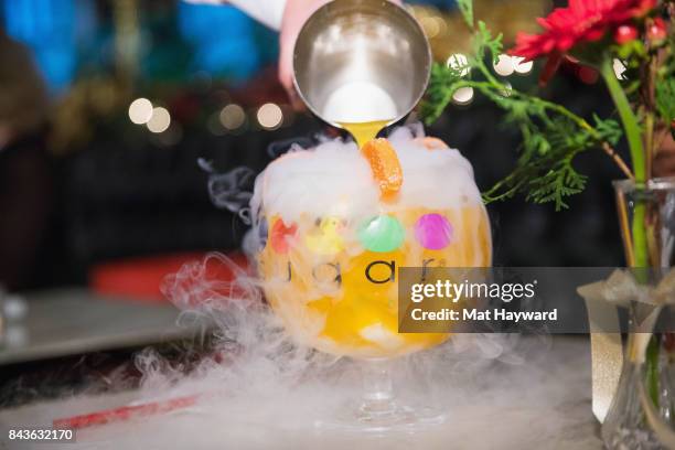 Cocktail is poured during the Grand Opening Of Sugar Factory American Brasserieon September 6, 2017 in Bellevue, Washington.