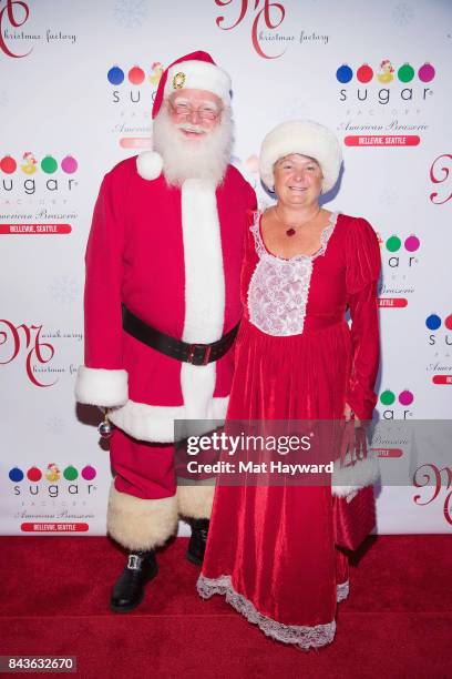 Santa and Mrs. Claus attend The Grand Opening Of Sugar Factory American Brasserieon September 6, 2017 in Bellevue, Washington.