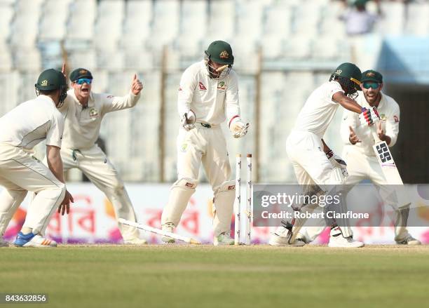 Taijul Islam of Bangladesh is bolwed by Nathan Lyon of Australia during day four of the Second Test match between Bangladesh and Australia at Zahur...