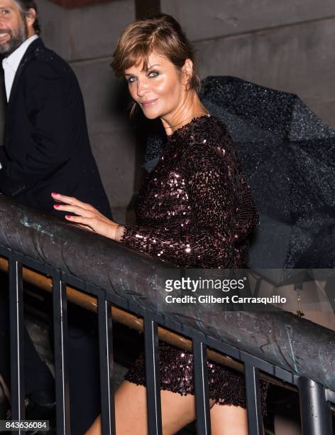 Model Helena Christensen arrives to the Tom Ford Spring/Summer 2018 Runway Show at Park Avenue Armory on September 6, 2017 in New York City.