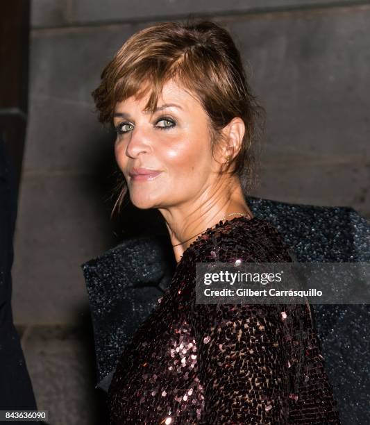 Model Helena Christensen arrives to the Tom Ford Spring/Summer 2018 Runway Show at Park Avenue Armory on September 6, 2017 in New York City.