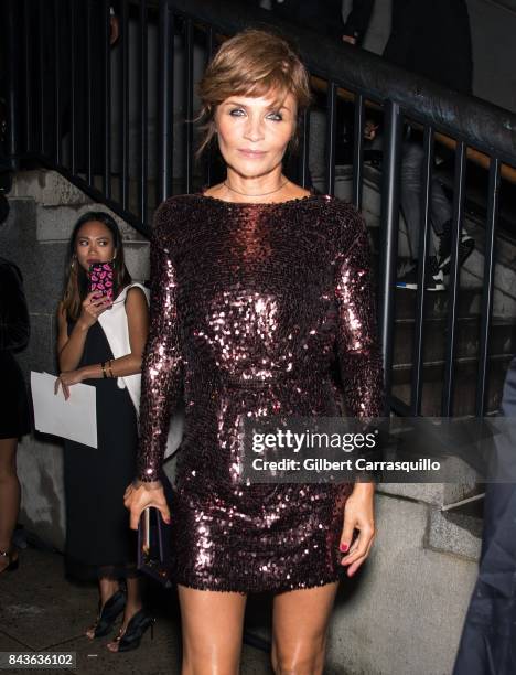 Model Helena Christensen arrives to the Tom Ford Spring/Summer 2018 Runway Show at Park Avenue Armory on September 6, 2017 in New York City.