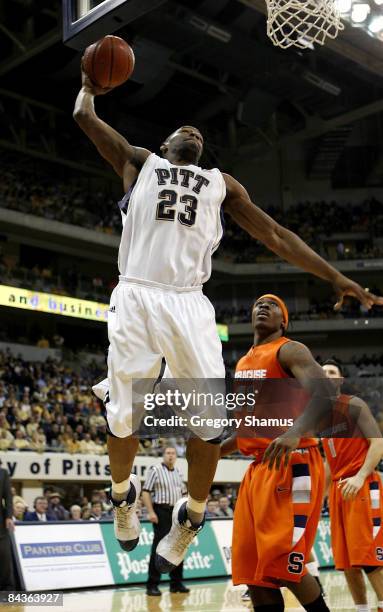 Sam Young of the Pittsburgh Panthers gets in for a second half dunk in front of Paul Harris of the Syracuse Orange on January 19, 2009 at the...