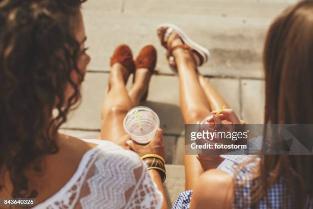 relaxing and tanning - take away food drink stock pictures, royalty-free photos & images