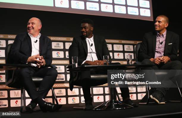 Mike Phelan, Kolo Toure and Stan Collymore talk during day 3 of the Soccerex Global Convention at Manchester Central Convention Complex on September...