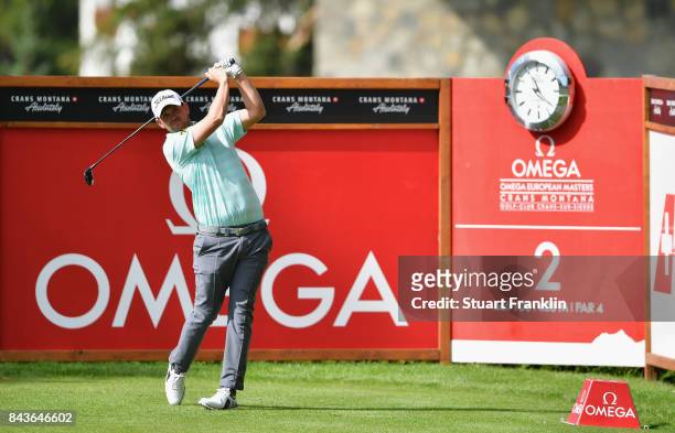 Bernd Wiesberger of Austria tees off on the 2nd during day one of the 2017 Omega European Masters at Crans-sur-Sierre Golf Club on September 7, 2017...