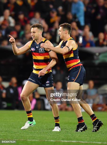 Brodie Smith of the Crows celebrates after kicking a goal during the AFL First Qualifying Final match between the Adelaide Crows and the Greater...