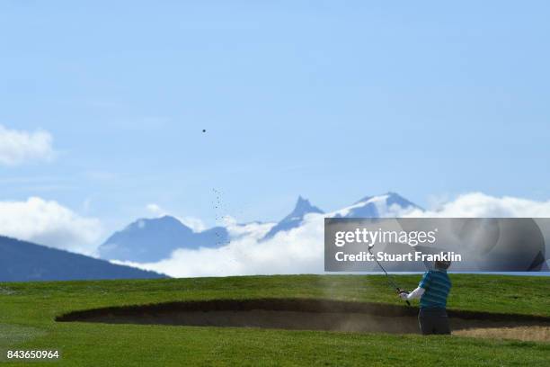 Fabricio Zanotti of Paraguay plays out of a bunker on the 7th during day one of the 2017 Omega European Masters at Crans-sur-Sierre Golf Club on...