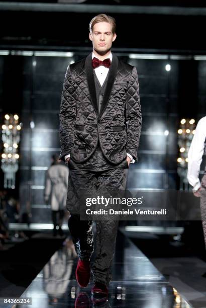 Model walks the runway during the Dolce & Gabbana show as part of Milan Fashion Week Autumn/Winter 2009/10 Menswear on January 17, 2009 in Milan,...