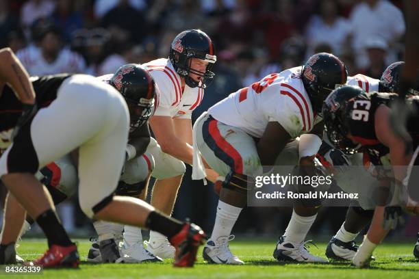 Quarterback Jevan Snead of the Mississippi Rebels drops back to pass against the Texas Tech Red Raiders during the AT&T Cotton Bowl on January 2,...