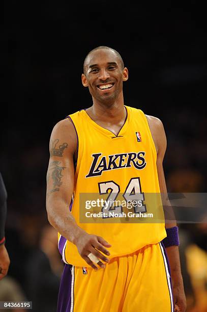 Kobe Bryant of the Los Angeles Lakers smiles during a game against the Cleveland Cavaliers at Staples Center on January 19, 2009 in Los Angeles,...