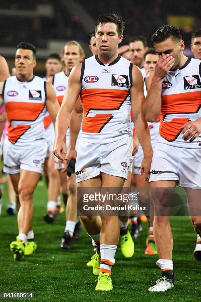 Toby Greene of the Giants leads his team mates from the field at half time during the AFL First Qualifying Final match between the Adelaide Crows and...
