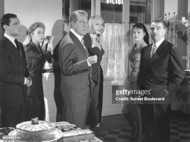 Jean Gabin on the set of Touchez pas au grisbi directed by Jacques Becker.