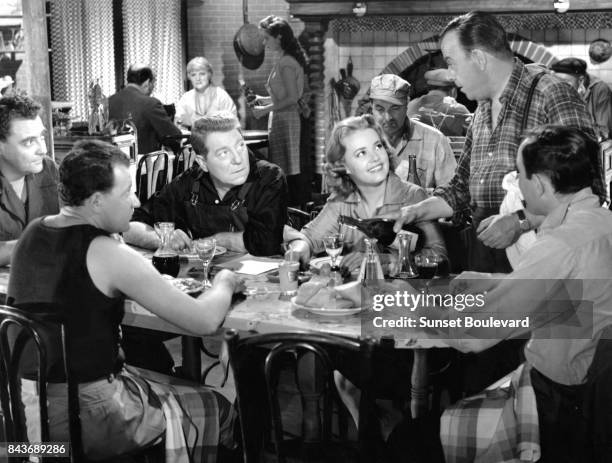 Jean Gabin and Jeanne Moreau on the set of Gas-oil directed by Gilles Grangier.