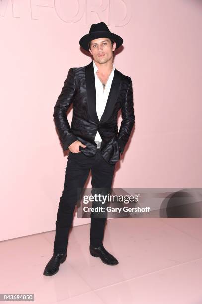Champion professional bull rider and fashion model Bonner Bolton attends the Tom Ford fashion show during New York Fashion Week on September 6, 2017...