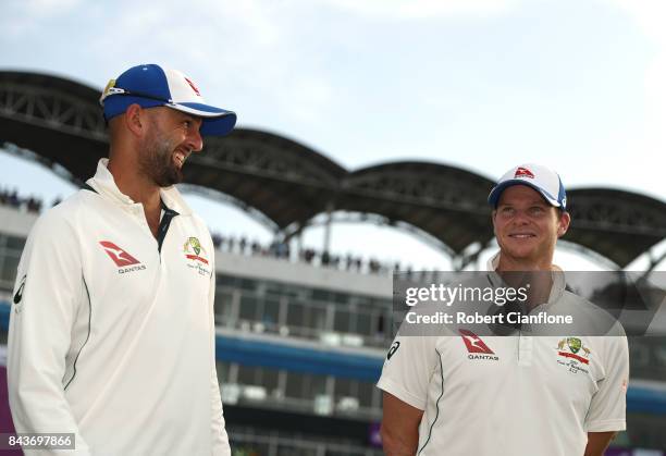 Nathan Lyon and Steve Smith of Australia talk after Australia defeated Bangladesh on day four of the Second Test match between Bangladesh and...