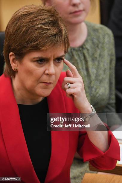 First Minister of Scotland Nicola Sturgeon answers questions during first ministers questions in the Scottish Parliamnet on September 7, 2017 in...