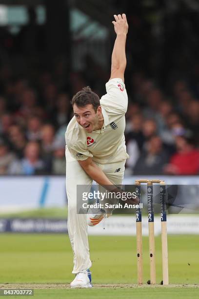 Toby Roland-Jones of England bowls during day one of the 1st Investec Test match between England and West Indies at Lord's Cricket Ground on...