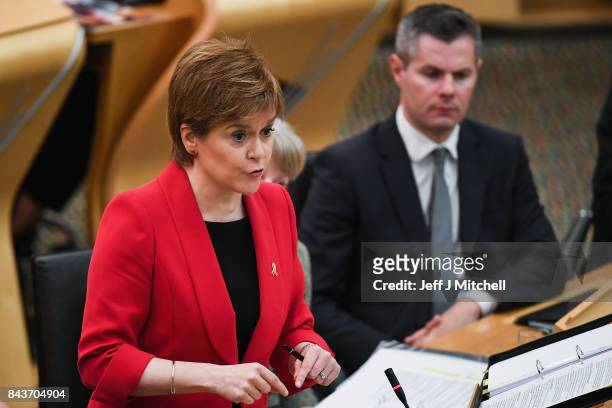 First Minister of Scotland Nicola Sturgeon answers questions during first ministers questions in the Scottish Parliamnet on September 7, 2017 in...