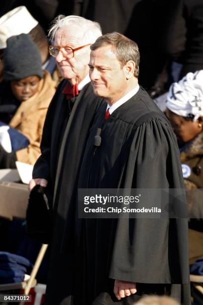 Supreme Court Justices John Paul Stevens and Chief Justice John Roberts arrive at the inauguration of Barack Obama as the 44th President of the...