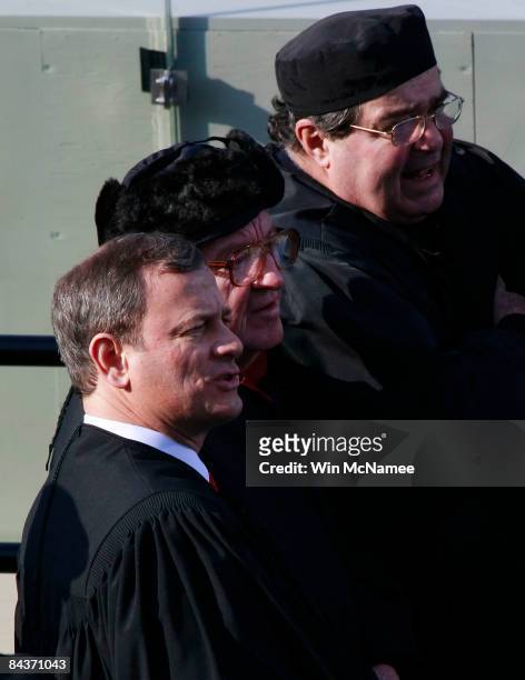 Supreme Court Justices John Roberts , John Paul Stevens, and Antonin Scalia arrive at the inauguration of Barack Obama as the 44th President of the...