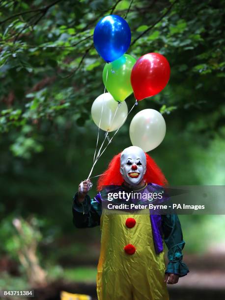 Person wearing a clown costume in Liverpool, as reviews for the film adaptation of Stephen King's It are in, with critics predicting the movie will...