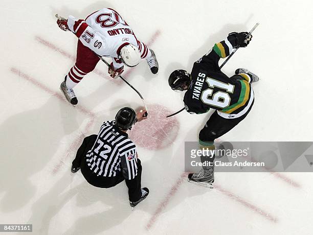 John Tavares of the London Knights gets set to take a face-off against Peter Holland of the Guelph Storm in a game on January 16, 2009 at the John...