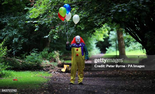Person wearing a clown costume in Liverpool, as reviews for the film adaptation of Stephen King's It are in, with critics predicting the movie will...