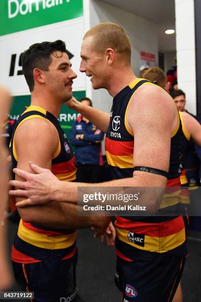 Taylor Walker and Sam Jacobs of the Crows celebrate after during the AFL First Qualifying Final match between the Adelaide Crows and the Greater...