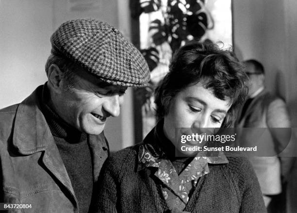 Michel Audiard and Annie Girardot on the set of Elle boit pas, elle fume pas, elle drague pas...mais elle cause directed by Michel Audiard