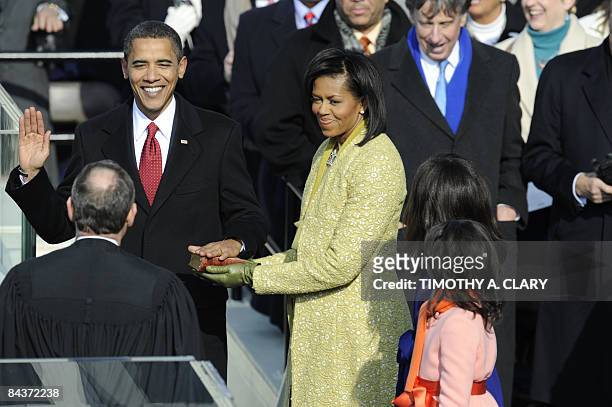 Barack Obama is sworn in as the 44th US president by Supreme Court Chief Justice John Roberts in front of the Capitol in Washington on January 20,...