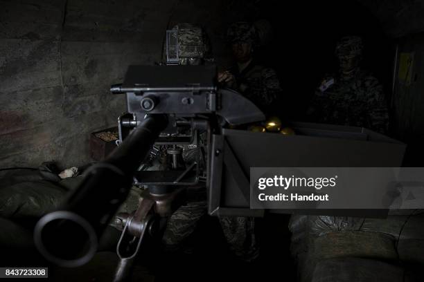 In this handout photo released by the South Korean Defense Ministry, South Korean marines participate in an exercise on September 6, 2017 in...