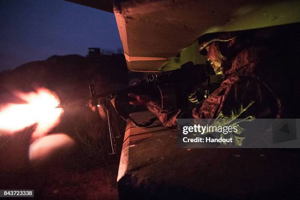 In this handout photo released by the South Korean Defense Ministry, South Korean marines participate in an exercise on September 6, 2017 in...