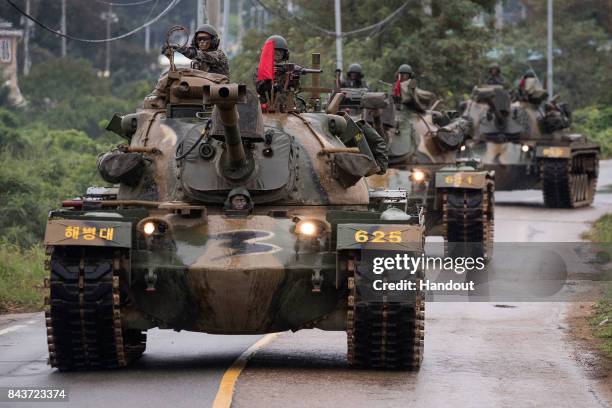 In this handout photo released by the South Korean Defense Ministry, South Korean marines participate in an exercise on September 6, 2017 in...