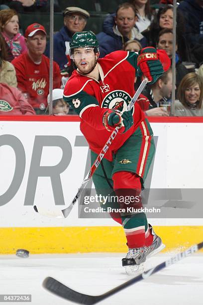 Brent Burns of the Minnesota Wild delivers a pass against the Edmonton Oilers during the game at the Xcel Energy Center on January 15, 2009 in Saint...