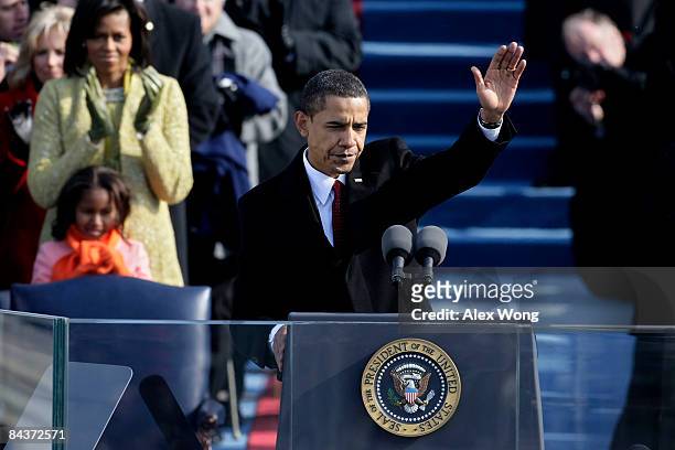 President Barack Obama waves after his inaugural address during his inauguration as the 44th President of the United States of America on the West...