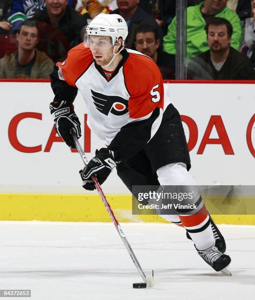 Braydon Coburn of the Philadelphia Flyers skates up ice with the puck during the game against the Vancouver Canucks at General Motors Place on...