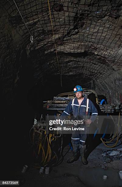 zinc miner with long-hole drill, portrait - zinc mining foto e immagini stock