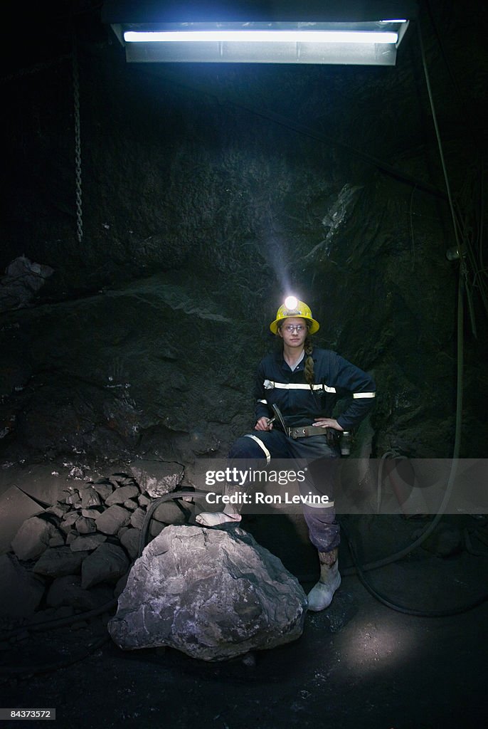 Female engineer below ground in a zinc mine
