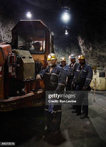 zinc miners with a 40-ton mine truck, portrait - underground mining stock pictures, royalty-free photos & images