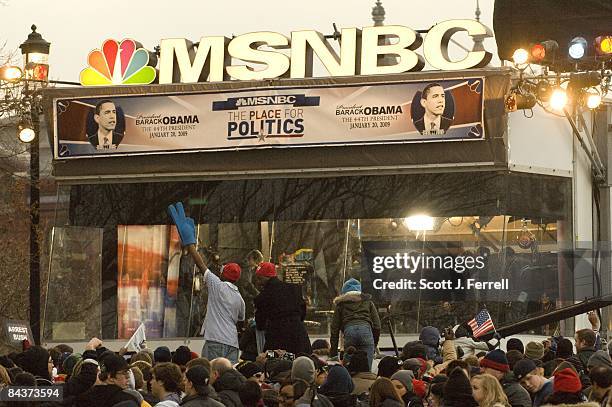 Jan. 19: A crowd gathers around an MSNBC mobile studio set up on the National Mall the day before the 56th inauguration, of President-elect Barack...