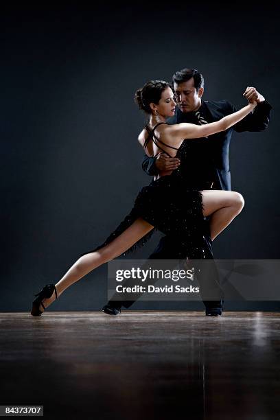 tango dancers - formal dancing stock pictures, royalty-free photos & images